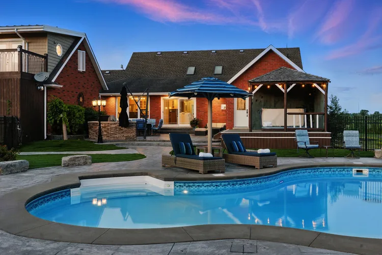 Backyard pool at sunset